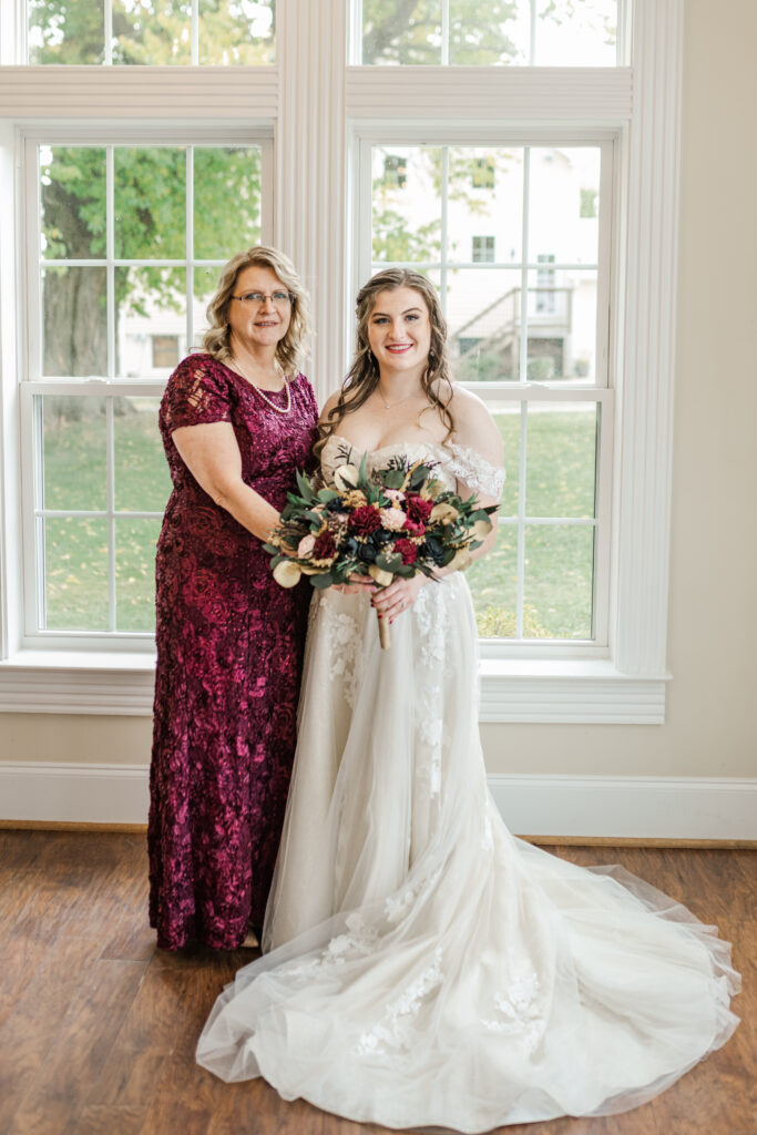 mom and daughter on wedding day